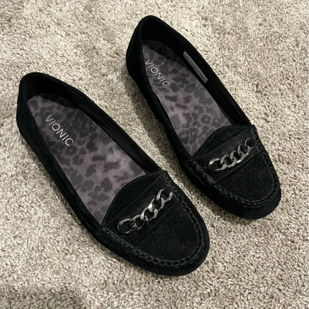 Vionic black suede Mesa loafers with gunmetal/muted silver chain accent